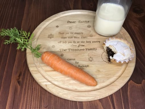 Personalised round wooden Christmas Eve board.