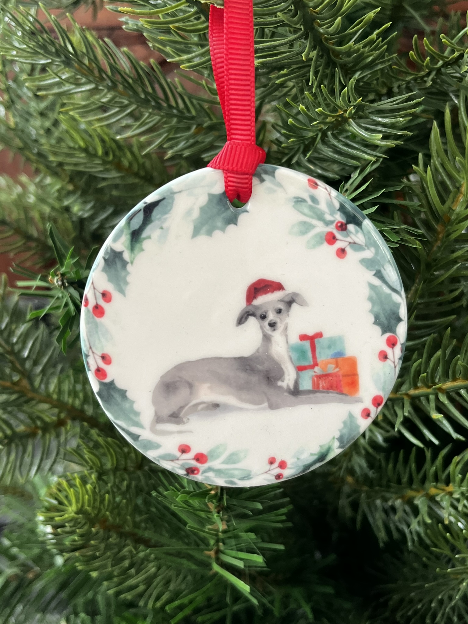 Ceramic hanging decoration has a lovely image of an Italian Greyhound printed on it.