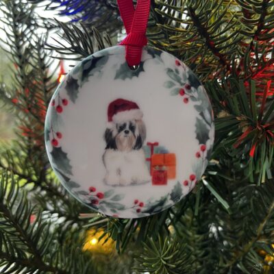 Hanging decoration of a Shih Tzu sitting down wearing a Christmas hat