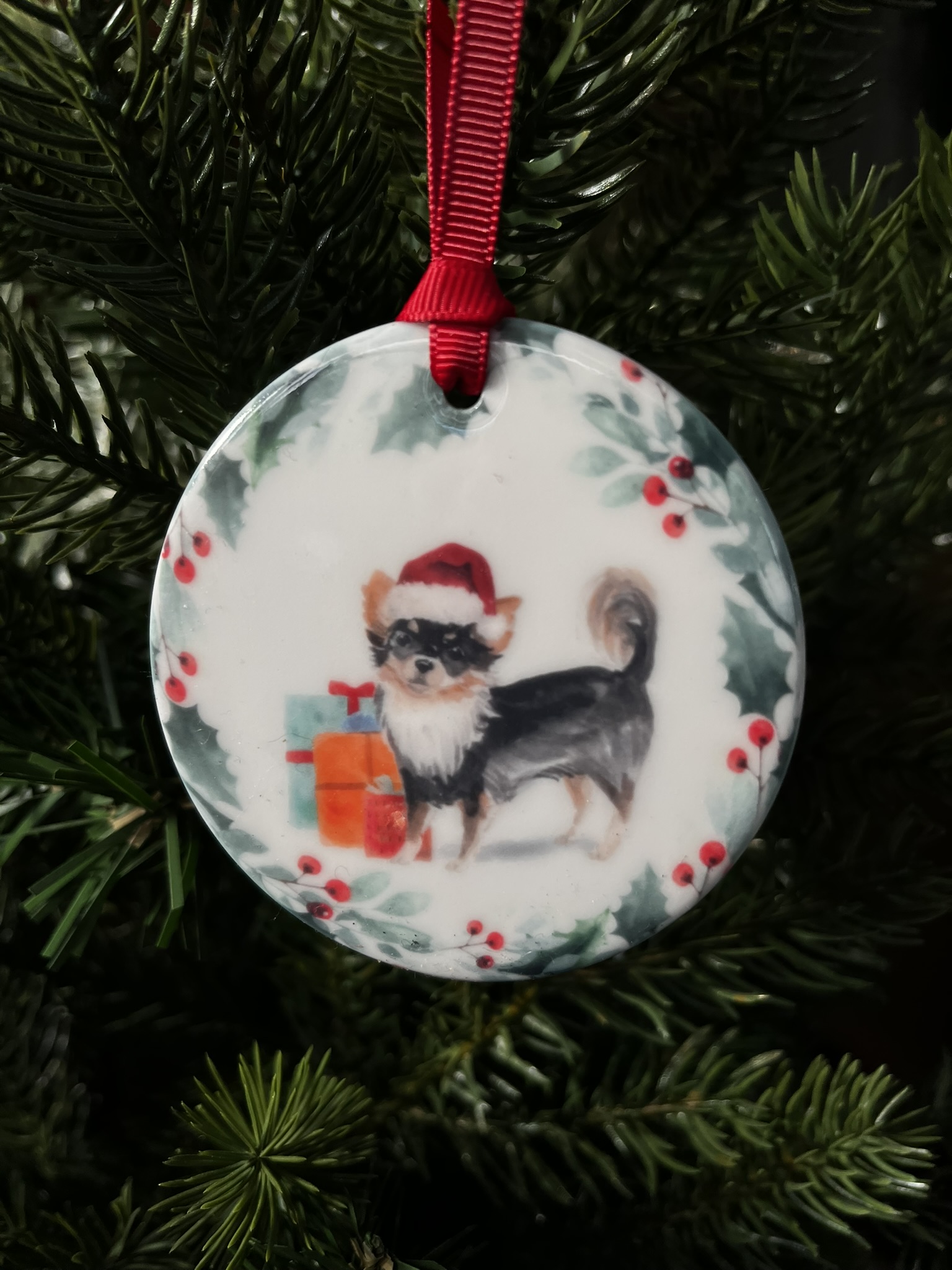 Hanging decoration of a Tri coloured Chihuahua wearing a Christmas hat