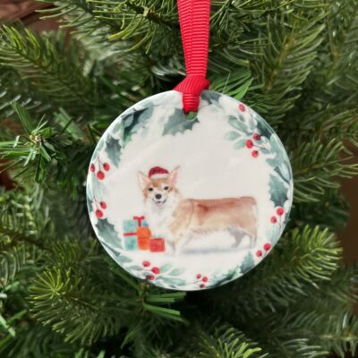 Ceramic hanging decoration with a watercolour image of a Corgi on it.