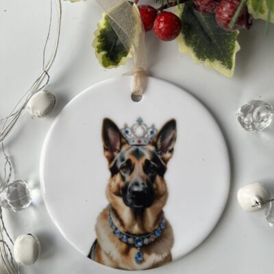 Charming ceramic decoration featuring a German Shepherd wearing a silver crown.