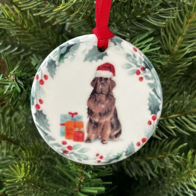 Hanging decoration of a Newfoundland wearing a Christmas hat