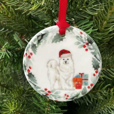 Hanging decoration of a Samoyed wearing a Christmas hat