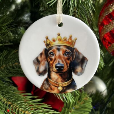 Charming ceramic Dachshund decoration featuring a Tan Dachshund wearing a golden crown.