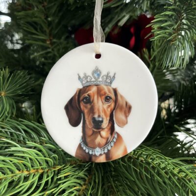 Charming ceramic Dachshund decoration featuring Tan Dachshund wearing a silver crown.