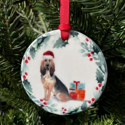 Bloodhound hanging decoration wearing a Christmas hat