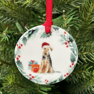 Ceramic hanging decoration with an image of a Welsh Terrier printed on it
