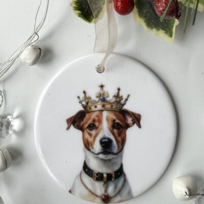 Charming ceramic decoration featuring a Jack Russell wearing a golden crown.