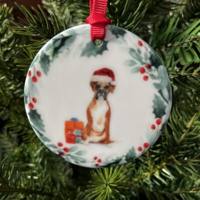 Hanging decoration with an image of a Boxer dog wearing a Christmas hat