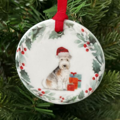 Ceramic hanging decoration with an image of a Lakeland Terrier printed on it
